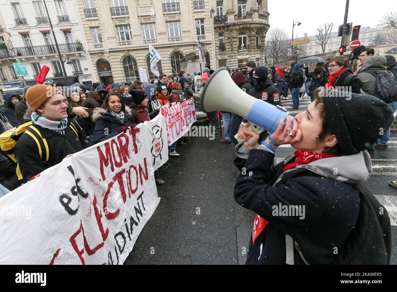 Protesters shout slogans and hold banners as they take part in a demonstration against a French government's proposed reform of university applications and a project to reform the French baccalaureate high school exit exam on February 6, 2018, in Paris. (Photo by Michel Stoupak/NurPhoto) Stock Photo