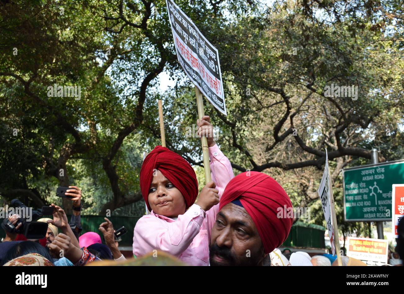 Protestors carry placards demanding arrest of Congress leader Jagdish Tytler for his alleged involvement in the 1984 anti-Sikh riots in New Delhi. 9th February, 2018 (Photo by Sahiba Chawdhary/NurPhoto) Stock Photo