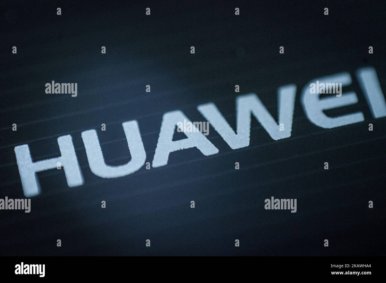 The Huawei logo is seen on a mobile phone on February 12, 2018. Chinese Huawei is the worlds thrid largest phone maker after Samsung and Apple. (Photo by Jaap Arriens/NurPhoto) Stock Photo