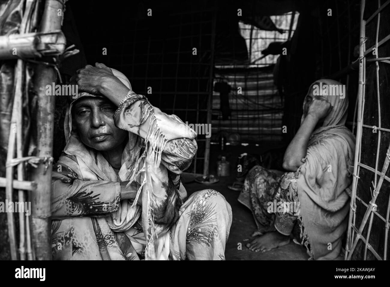 A Rohingya refugee woman in his shelter at Kutupalong refugee camp near Cox's Bazar, Bangladesh, November 22, 2017. (Photo by Szymon Barylski/NurPhoto) Stock Photo