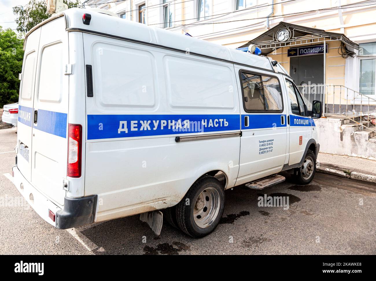 Torzhok, Russia - July 12, 2022: Police minivan parked near city police station of the city center in summer day Stock Photo