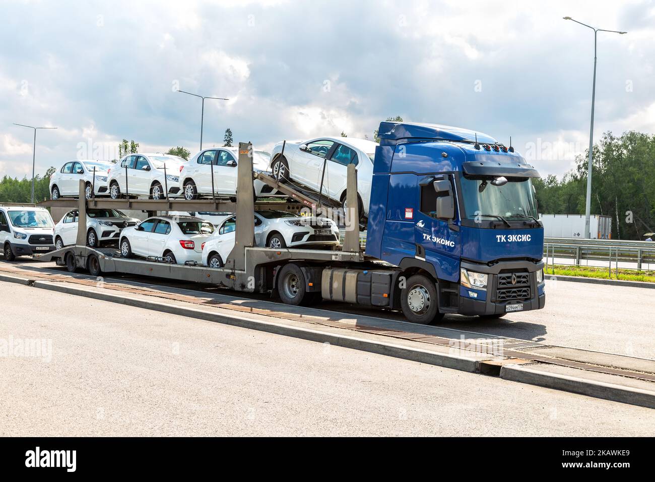 Moscow, Russia - July 12, 2022: Car transporter carries new Renault vehicles along the highway. Car carrier transporter truck on a freeway Stock Photo