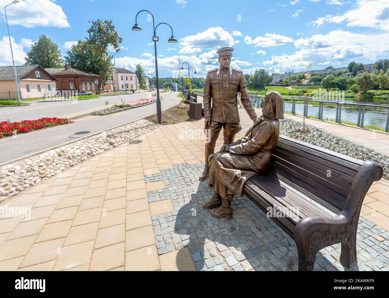 Borovichi, Russia - July 17, 2022: Bronze monument to a red army officer and a nurse. Red Army soldier and sister of mercy Stock Photo