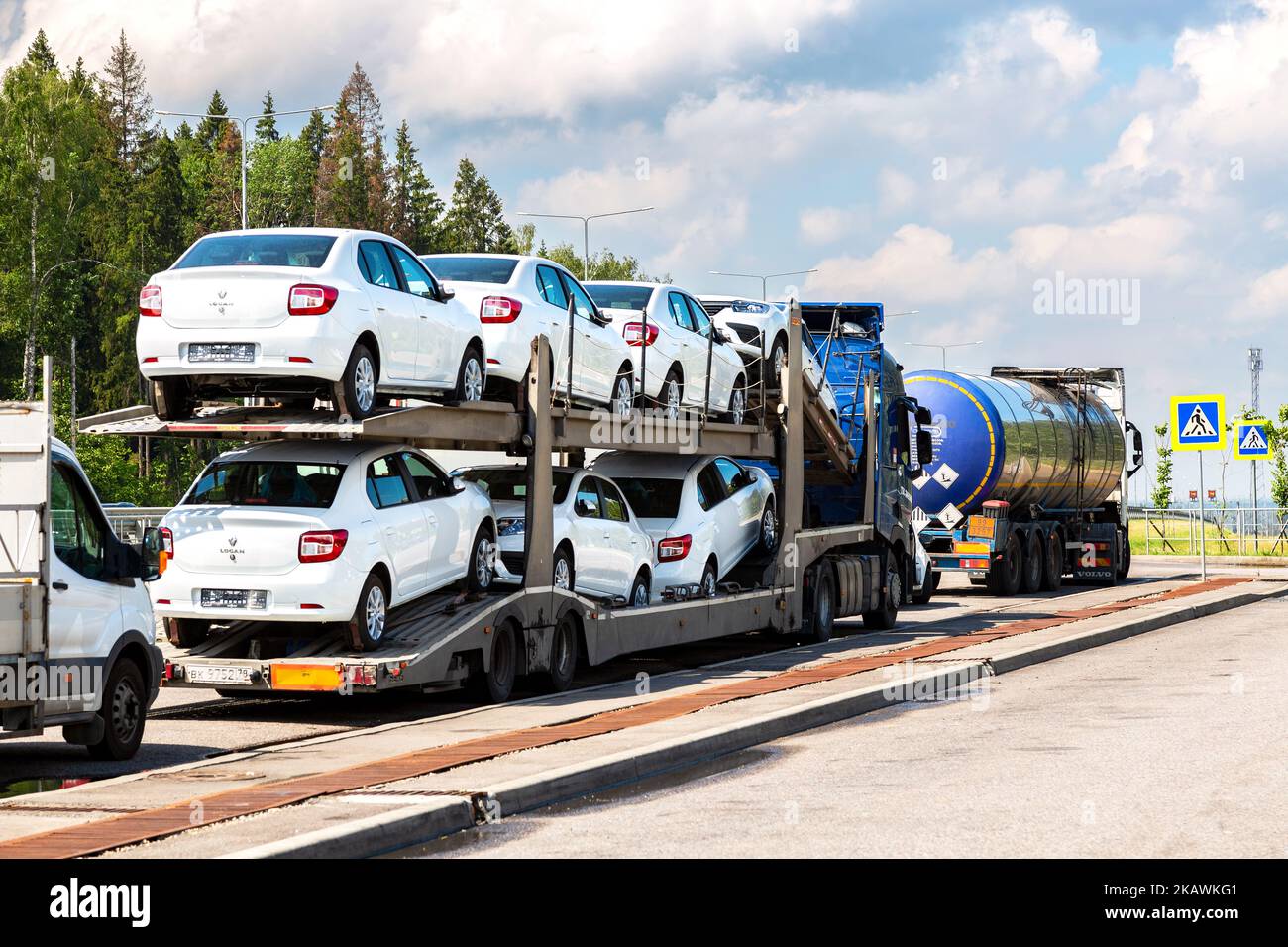 Moscow, Russia - July 12, 2022: Car transporter carries new Renault vehicles along the highway. Car carrier transporter truck on a freeway Stock Photo