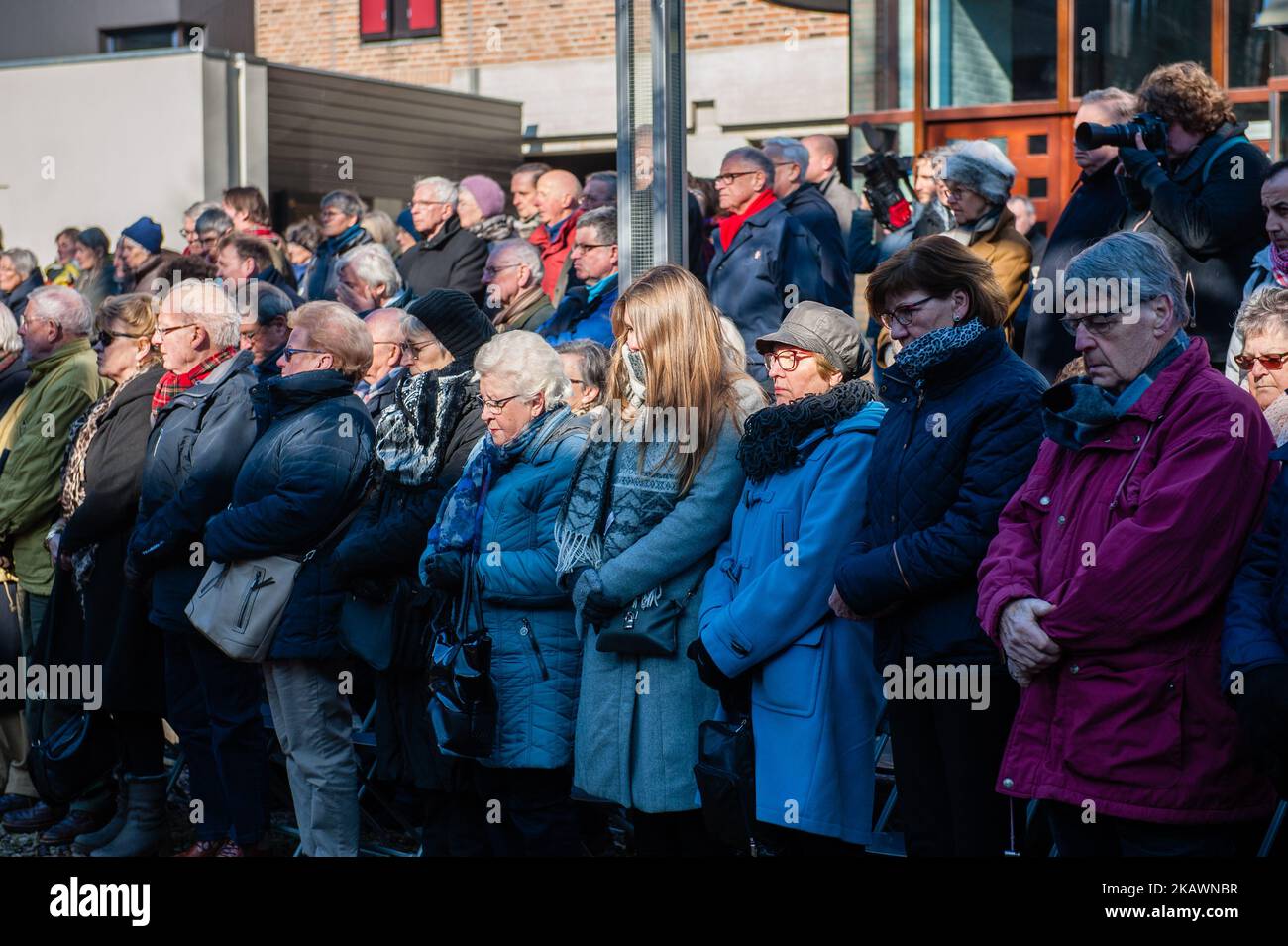 People take part at annual commemoration of the bombing in Nijmegen, Netherlands, on 22 February 2018. he Bombing of Nijmegen was an unplanned bombing attack by American aircraft on the city of Nijmegen in the Netherlands on 22 February 1944. During this Allied mistake bombing, almost 800 people were killed and a large part of the city center of Nijmegen was destroyed. Every February 22nd an official commemoration has take place at the Raadhuishof, the location where the Montessori school was located, where 24 children and 8 sisters were killed. There a monument called 'De Schommel' was erecte Stock Photo