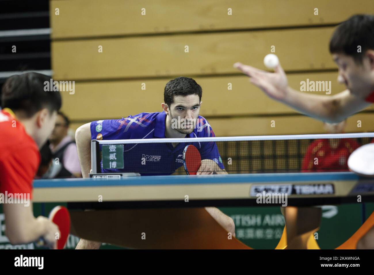 Xin XU and Long MA from China face Alexandre Cassin and Emmanuel Lebesson from France on the first day of ITTF Team Table Tennis World Cup on February 22, 2018 in Olympic Park in London. 12 teams compete in the tournament. (Photo by Dominika Zarzycka/NurPhoto) Stock Photo