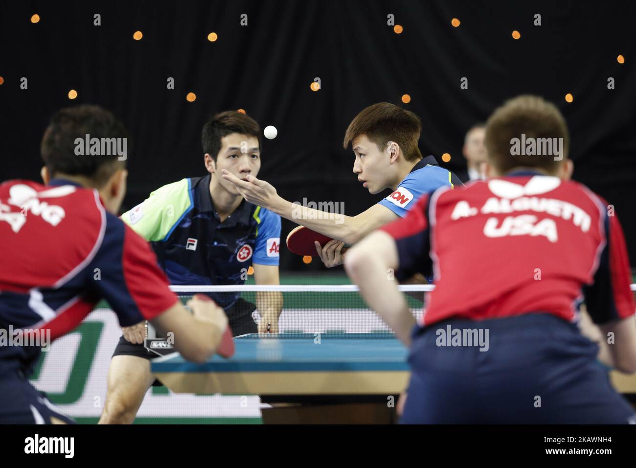 Ho Kwan Kit (left) and NG Pak Nam (right) face the USA team on the