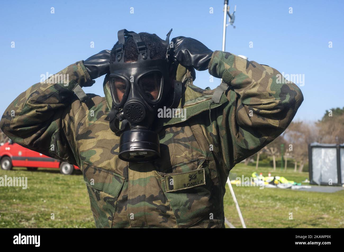 A soldier of the Spanish army puts on his antigas mask to participate in the simulation of a sarin gas attack in Santander, Spain on February 23, 2018. (Photo by Joaquin Gomez Sastre/NurPhoto) Stock Photo