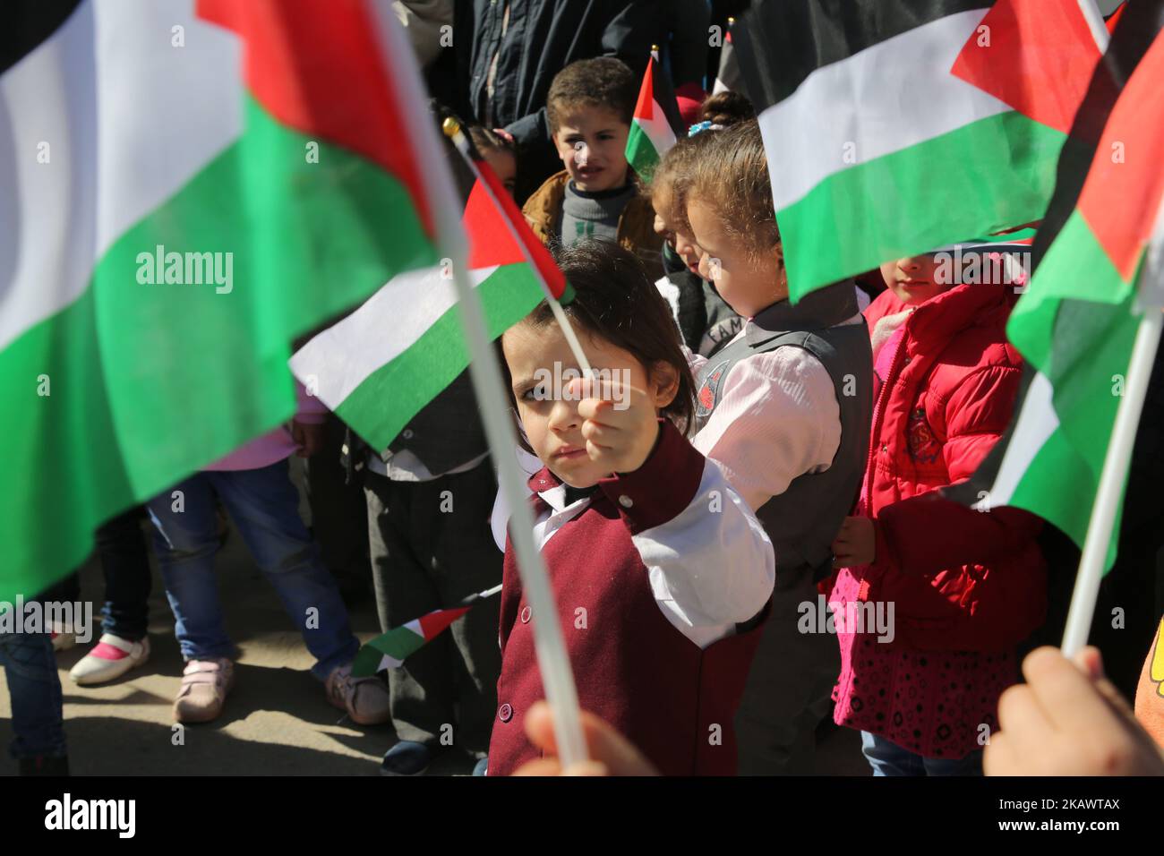 Palestinian children hold banners during a protest against U.S. President Donald Trump's decision to recognise Jerusalem as the capital of Israel, in front of the high commissioner for human rights headquarters, in Gaza city on February 28, 2018. (Photo by Majdi Fathi/NurPhoto) Stock Photo