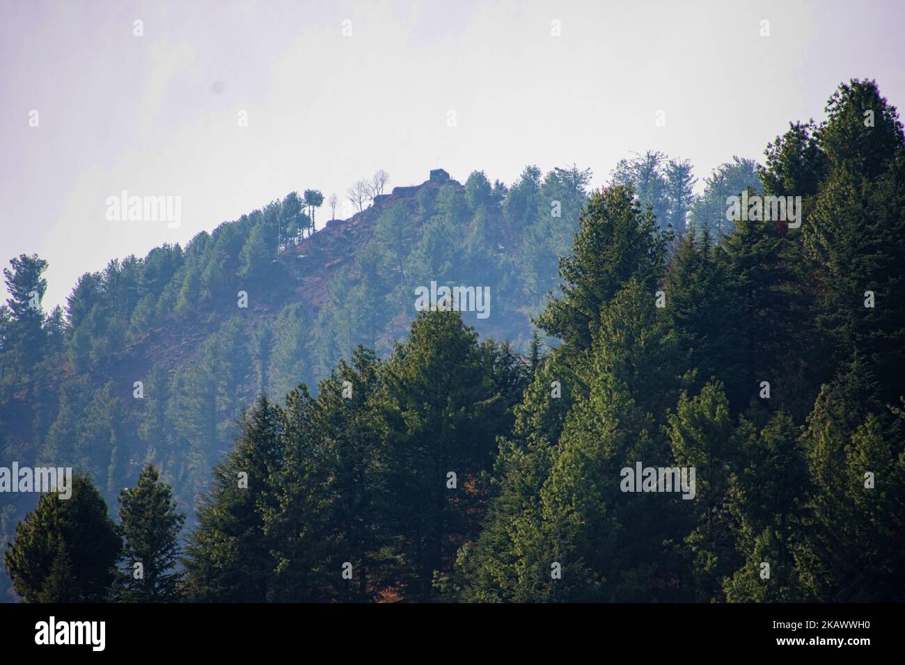 URI, KASHMIR, INDIA - FEBRUARY 27: Bunkers of Pakistan army can be seen from Indian controlled Kashmir during a fresh skirmish along the border on February 27, 2018 in Uri, 120 Kms (75 miles) north west of Srinagar , the summer capital of Indian administered Kashmir, India. The village with a population of a little over 12,000 has been bearing the brunt of cross-fire between nuclear rivals India and Pakistan. People living along the ceasefire line dividing Kashmir into India and Pakistan-administered portions have continually been at risk due to hostility between the armies of the two nuclear  Stock Photo
