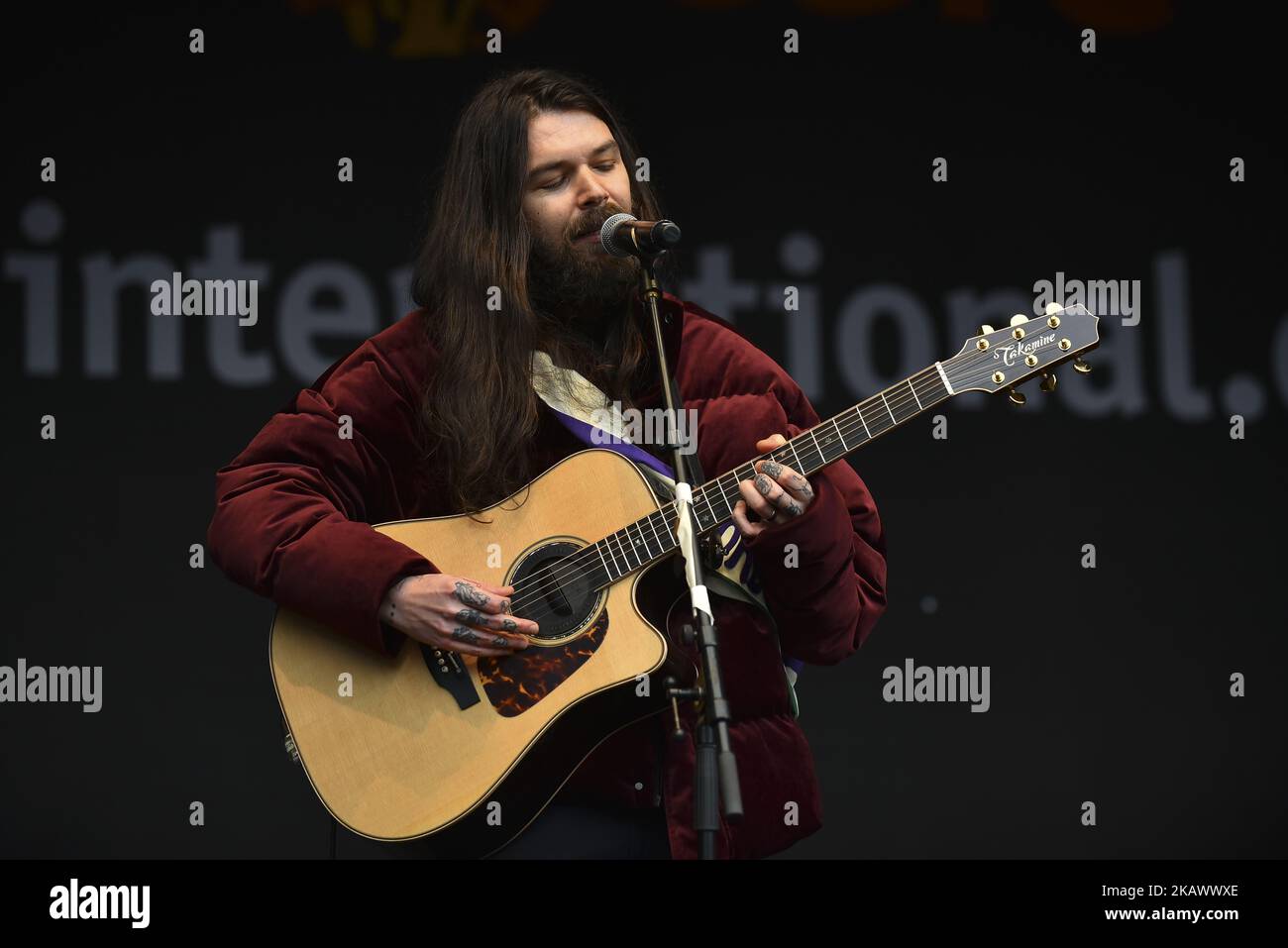 James Johnston of Scottish rock band Biffy Clyro performs on stage at the March4Women, London on March 4, 2018. Demonstrators march through central London with calls for an end to gender-based discrimination in the workplace. The event celebrates the upcoming International Women's Day, on March 8th, and marks 100 years since the first women in the UK gained the right to vote. (Photo by Alberto Pezzali/NurPhoto) Stock Photo