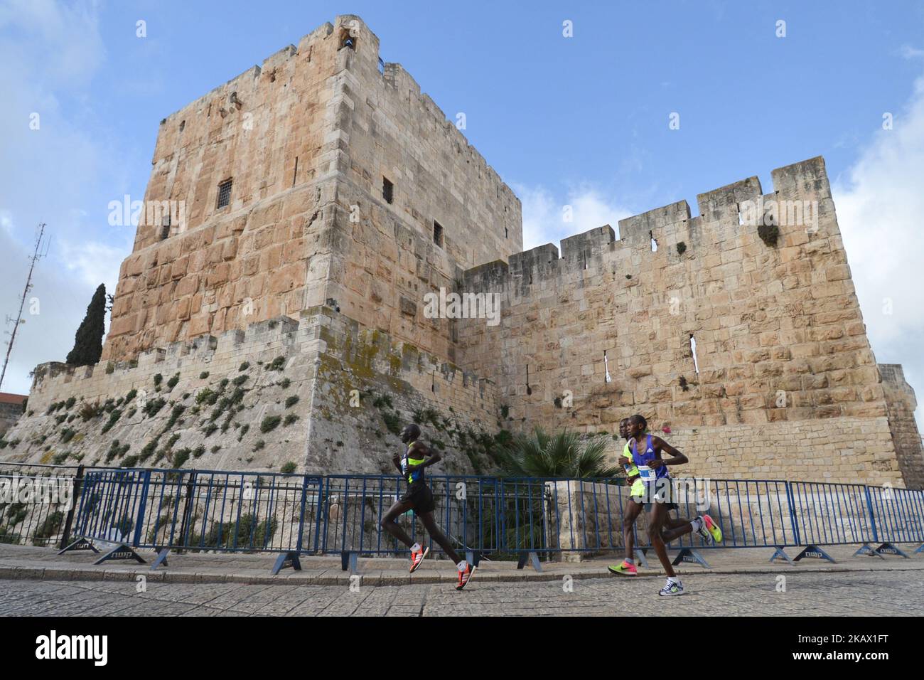 The leading group of runners seen inside Jerusalem's Old City, near The ...