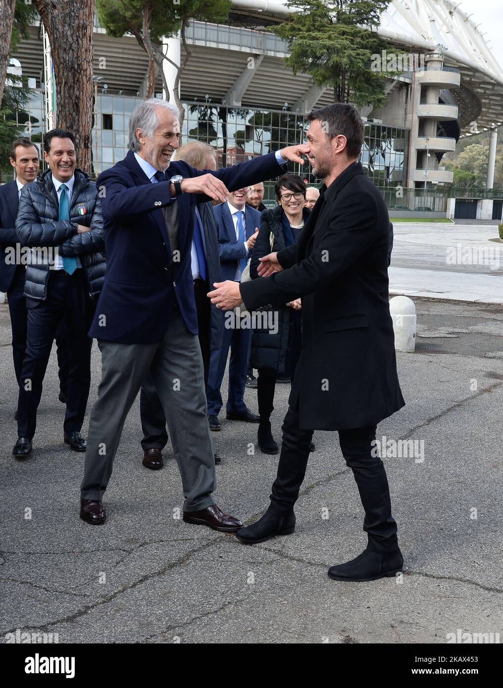 The president of the Italian Olympic Committee (CONI), Giovanni Malago welcomes former player Paolo Maldini during the ceremony Walk of Fame in Rome, Italy, on 12 March 2018. The Walk of Fame is enriched with 5 more samples. Along the Via Olimpiadi, which leads straight to the Olympic stadium in Rome, new plates have been added dedicated to five blue champions no longer in business: the historic Milan captain and national defender, soccer player Paolo Maldini, the swimmer Massimiliano Rosolino, the middle distance runner Luigi Beccali, the cyclist Ercole Baldini and the volleyball player Samue Stock Photo