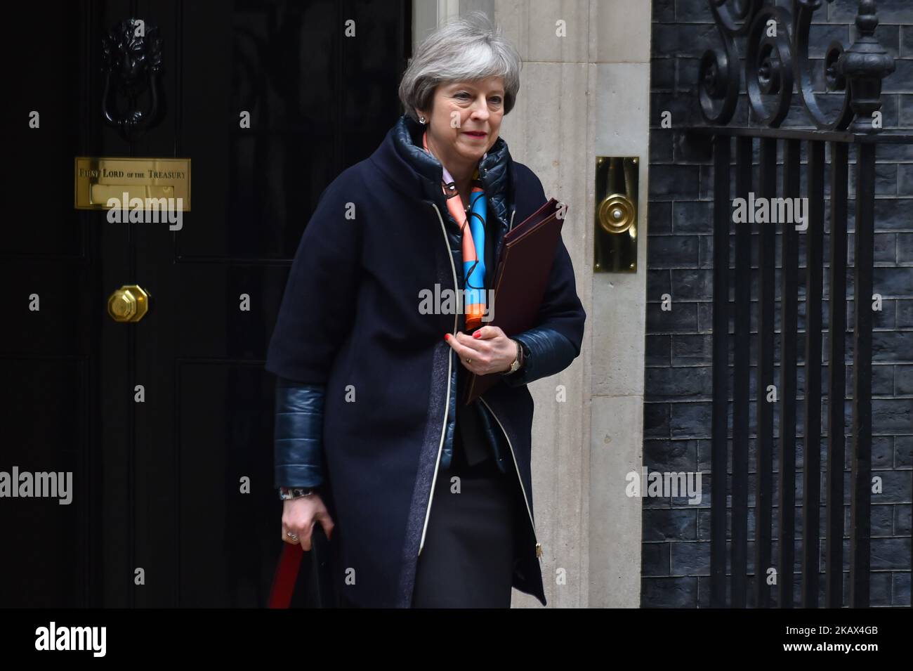 Prime Minister Theresa May leaves Downing Street after attending the weekly Cabinet meeting, London, UK on March 13, 2018. Prime Minister Theresa May and Chancellor of the Exchequer Philip Hammond headed to the Houses of Parliament as he gives Spring Budget update. (Photo by Alberto Pezzali/NurPhoto) Stock Photo