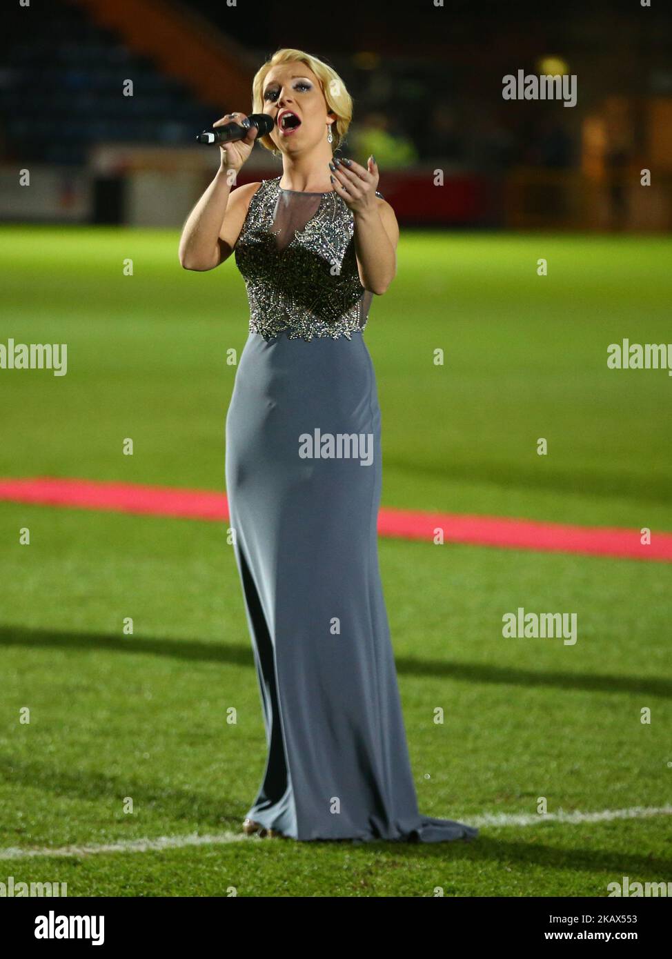 Emily Haig singing the National Anthem during The FA WSL Continental Tyres Cup Final match between Arsenal against Manchester City Women at Adams Park stadium, Wycombe England on 14 March 2018 (Photo by Kieran Galvin/NurPhoto)  Stock Photo