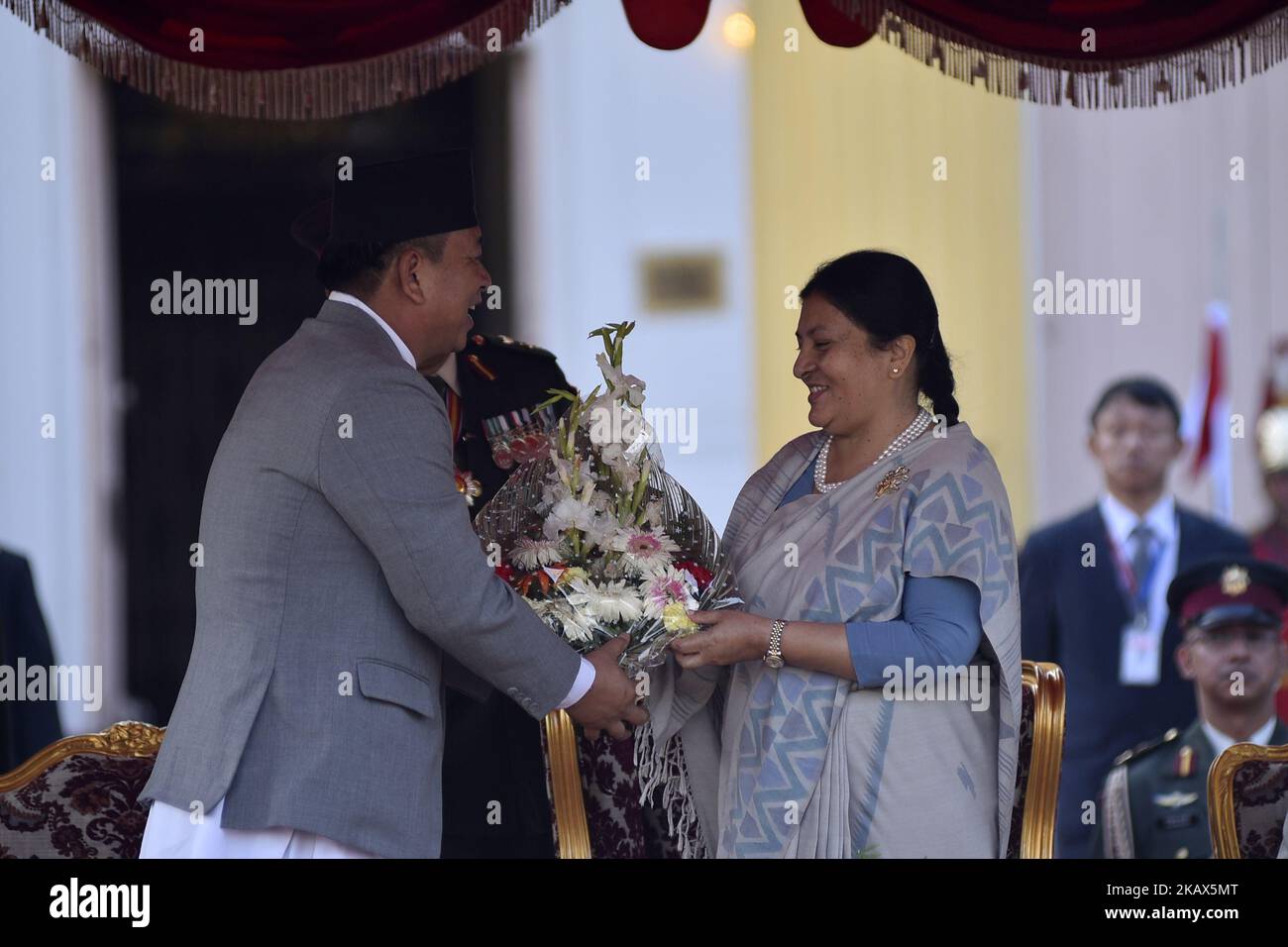 Vice President of Nepal, Nanda Kishor Pun greets Newly elected President of Nepal Bidhya Devi Bhandari at the Shital Niwas, Kathmandu, Nepal on Wednesday, March 14, 2018. (Photo by Narayan Maharjan/NurPhoto) Stock Photo