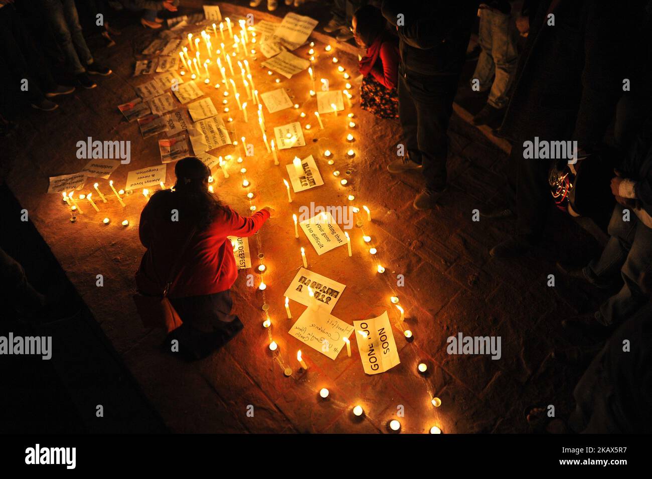 Nepalese People attend in a candlelight vigil to remember USBangla