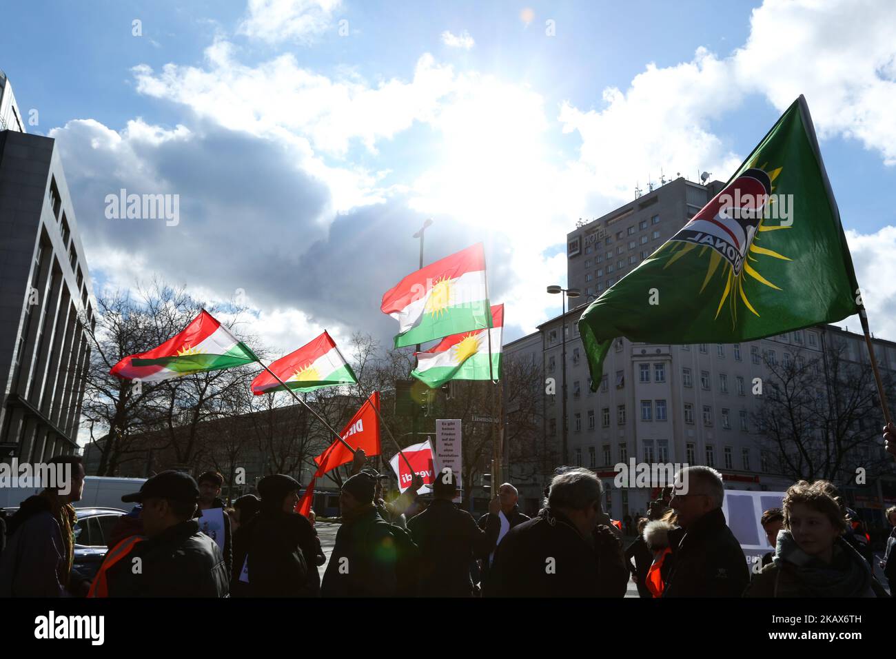 Some kurdish flags in the sky. Hundreds of people demonstrated in Munich, Germany, on 16 March 2018 to remember the chemical attack of Halabja by Sadam Hussein and to protest against Turkey's war on Afrin. The protest stayed very peaceful. (Photo by Alexander Pohl/NurPhoto) Stock Photo