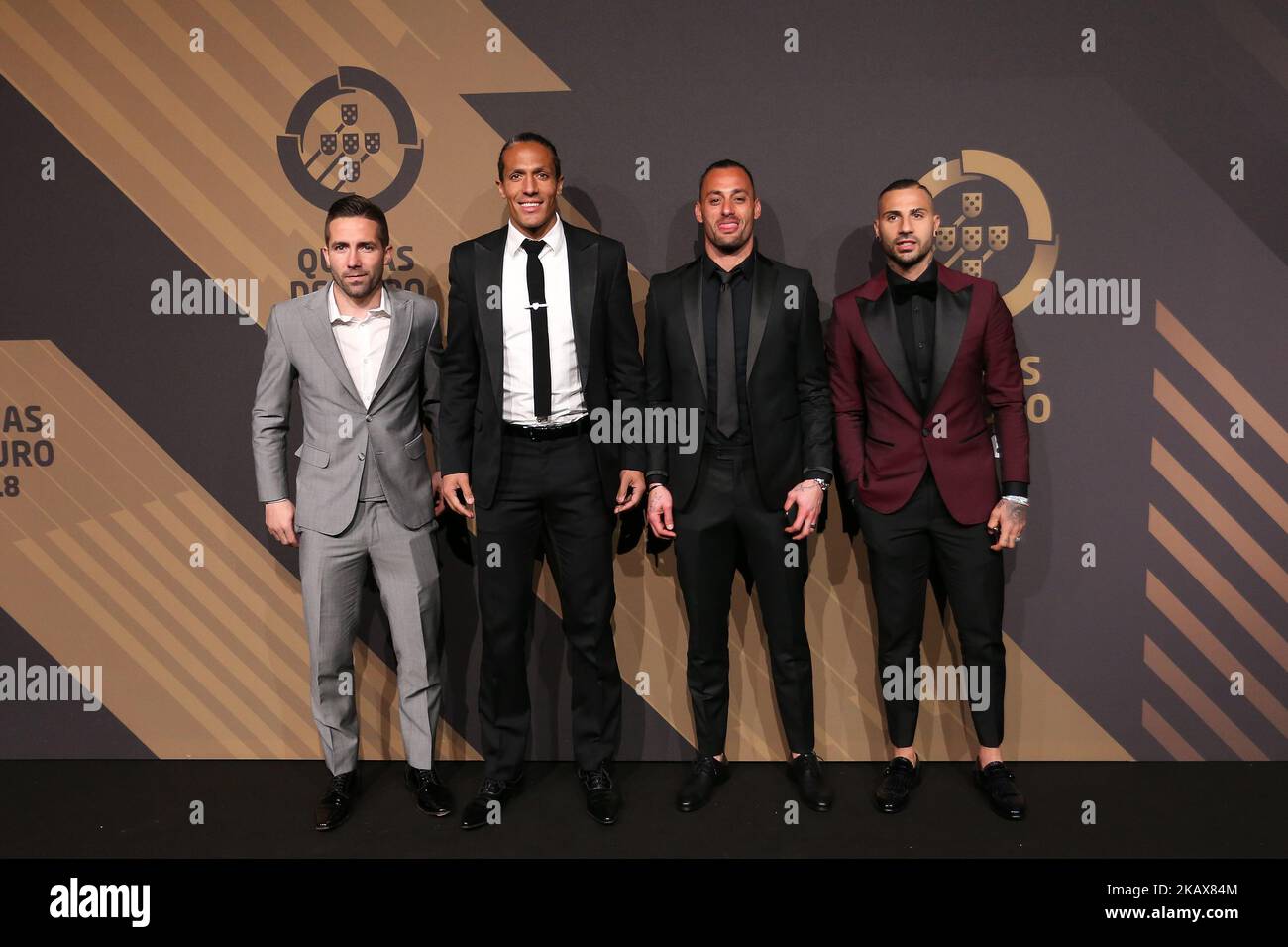 Portugal midfielder Joao Moutinho (L) with Portugals defender Bruno Alves (CL) and Portugals goalkeeper Beto (CR) with Portugals forward Ricardo Quaresma (R) poses on arrival at 'Quinas de Ouro' 2018 ceremony held and the Pavilhao Carlos Lopes in Lisbon, Portugal on March 19, 2018. (Photo by Bruno Barros / DPI / NurPhoto) Stock Photo