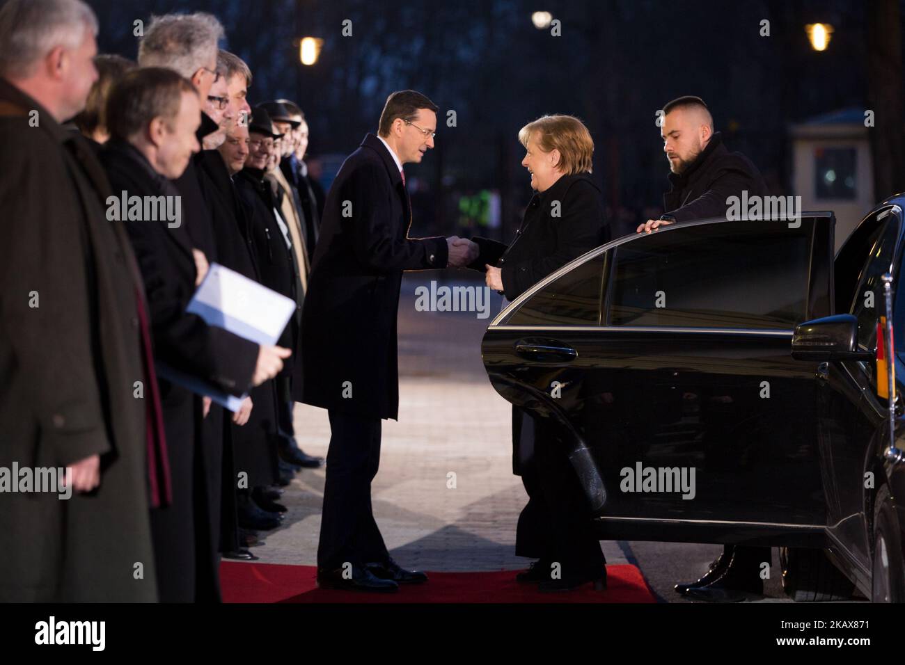 Polish Prime Minister Mateusz Morawiecki welcomes German Chancellor Angela Merkel before their meeting in Warsaw, Poland on March 19, 2018 (Photo by Mateusz Wlodarczyk/NurPhoto) Stock Photo