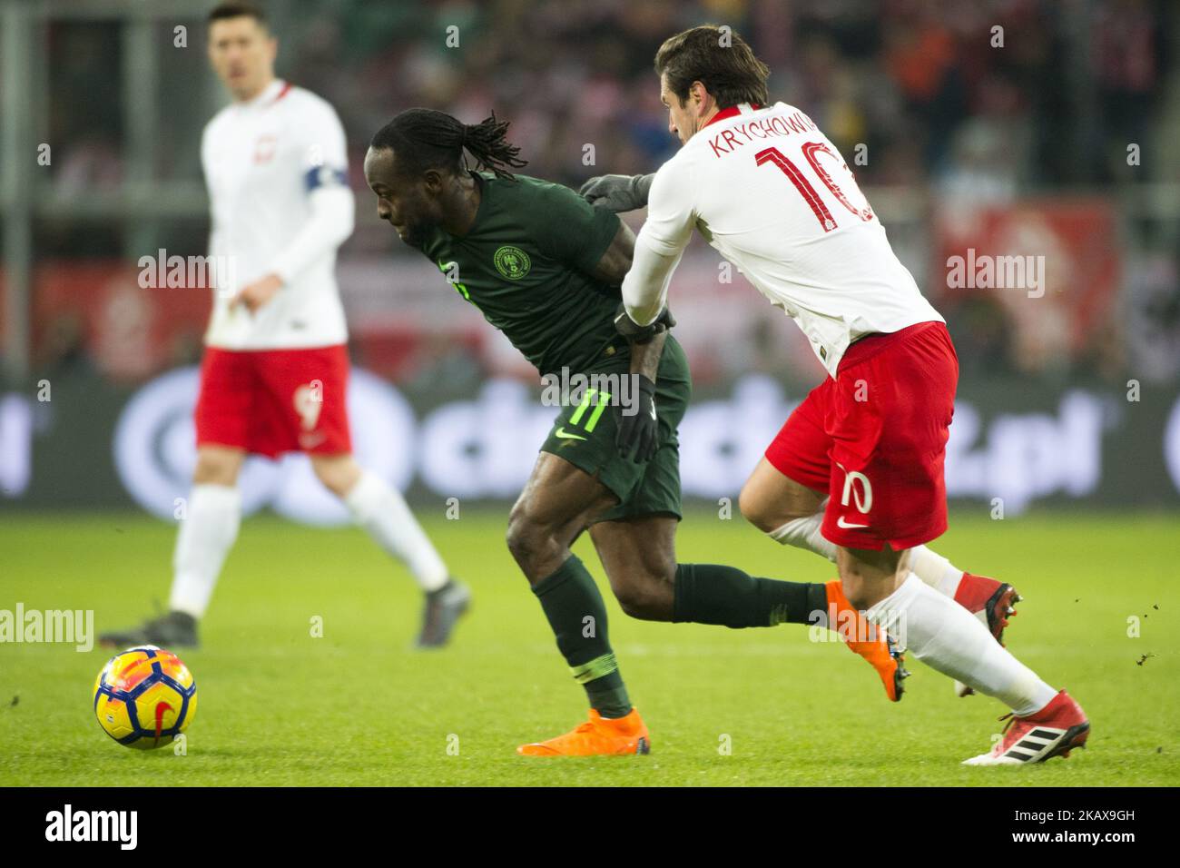 Victor Moses of Nigeria fights for the ball with Grzegorz Krychowiak of Poland during the international friendly match between Poland and Nigeria at Wroclaw Stadium in Wroclaw, Poland on March 23, 2018 (Photo by Andrew Surma/NurPhoto) Stock Photo