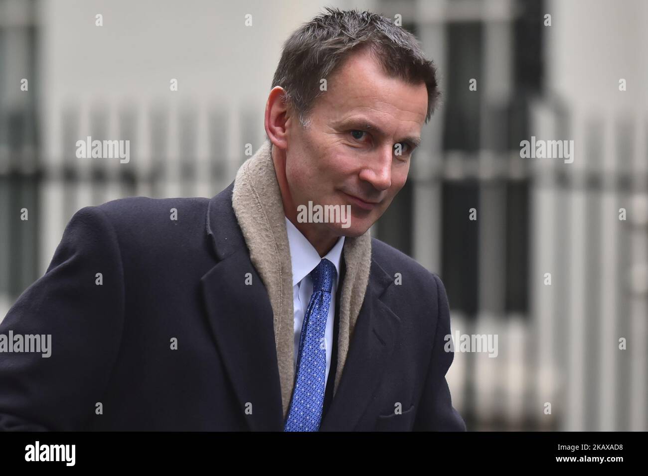 British Health Secretary Jeremy Hunt leaves 10 Downing Street after attending the weekly Cabinet Meeting, London on March 27, 2018. Prime Minister Theresa May is facing another Brexit hurdle after the opposition Labour Party announced its pushing for a legal commitment to avoid a hard border with Ireland after Britain leaves the European Union. The Migration Advisory Committee (MAC) said businesses are concerned about their ability to recruit workers from the EU after Britain leaves the EU. UK employers also see EU workers as 'more reliable' and eager than their British counterparts, the repor Stock Photo