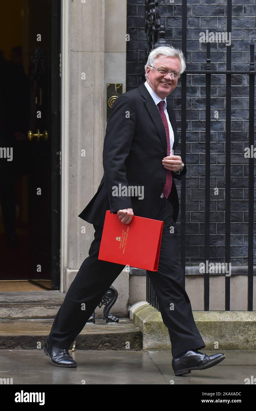 Brexit minister David Davis leaves 10 Downing Street after attending the weekly Cabinet Meeting, London on March 27, 2018. Prime Minister Theresa May is facing another Brexit hurdle after the opposition Labour Party announced its pushing for a legal commitment to avoid a hard border with Ireland after Britain leaves the European Union. The Migration Advisory Committee (MAC) said businesses are concerned about their ability to recruit workers from the EU after Britain leaves the EU. UK employers also see EU workers as 'more reliable' and eager than their British counterparts, the report said. ( Stock Photo