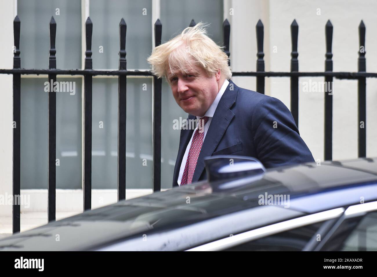 British Foreign Secretary Boris Johnson leaves 10 Downing Street after attending the weekly Cabinet Meeting, London on March 27, 2018. Prime Minister Theresa May is facing another Brexit hurdle after the opposition Labour Party announced its pushing for a legal commitment to avoid a hard border with Ireland after Britain leaves the European Union. The Migration Advisory Committee (MAC) said businesses are concerned about their ability to recruit workers from the EU after Britain leaves the EU. UK employers also see EU workers as 'more reliable' and eager than their British counterparts, the re Stock Photo