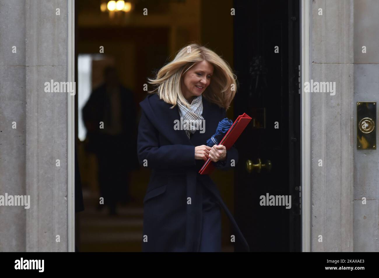 Secretary of State for Work and Pensions esther McVey leaves 10 Downing Street after attending the weekly Cabinet Meeting, London on March 27, 2018. Prime Minister Theresa May is facing another Brexit hurdle after the opposition Labour Party announced its pushing for a legal commitment to avoid a hard border with Ireland after Britain leaves the European Union. The Migration Advisory Committee (MAC) said businesses are concerned about their ability to recruit workers from the EU after Britain leaves the EU. UK employers also see EU workers as 'more reliable' and eager than their British counte Stock Photo