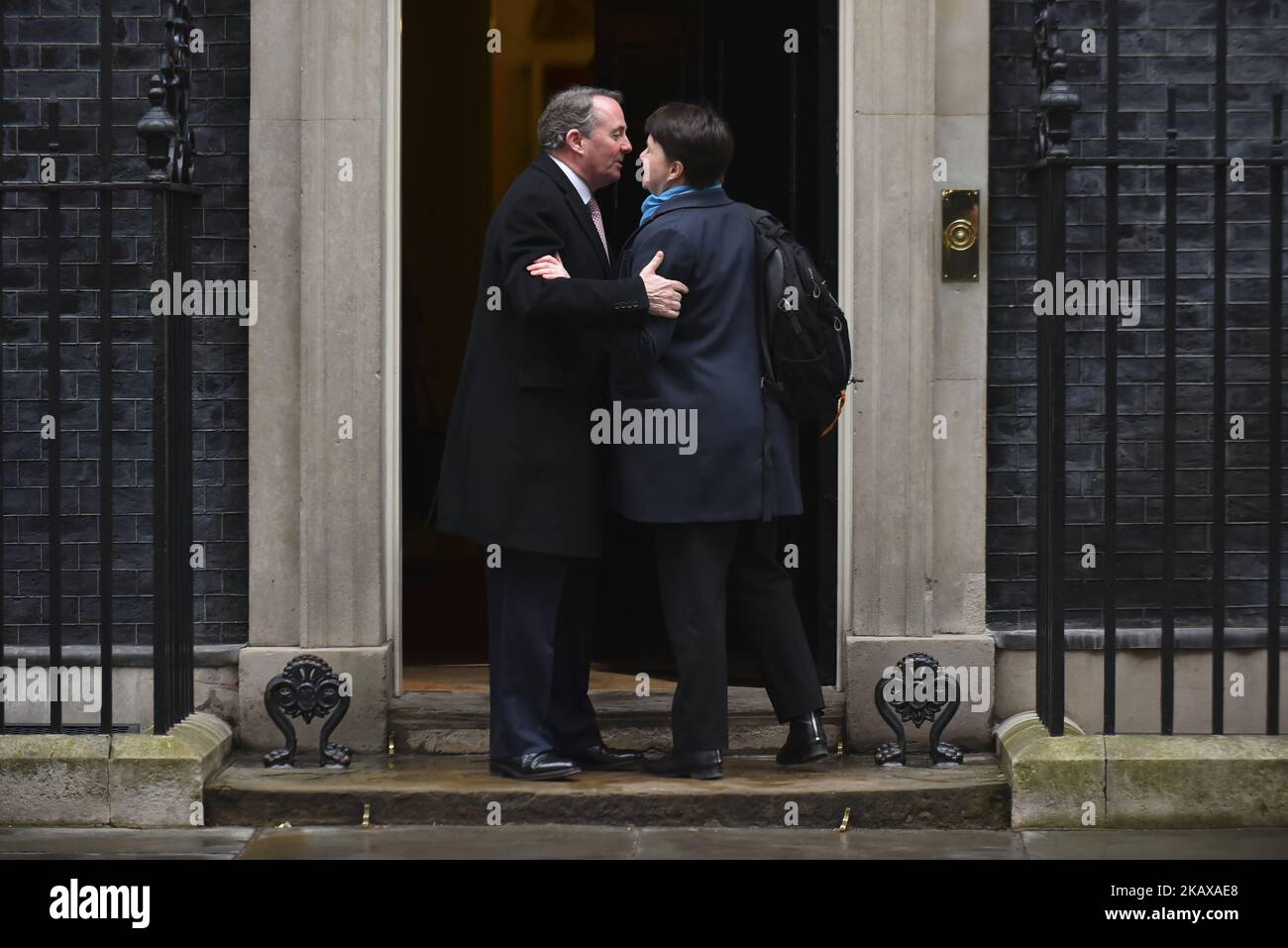 Ruth Davidson, leader of the Scottish Conservatives greets Secretary of State for Trade Liam Fox (R) arrives at 10 Downing Street, London on March 27, 2018. Prime Minister Theresa May is facing another Brexit hurdle after the opposition Labour Party announced its pushing for a legal commitment to avoid a hard border with Ireland after Britain leaves the European Union. The Migration Advisory Committee (MAC) said businesses are concerned about their ability to recruit workers from the EU after Britain leaves the EU. UK employers also see EU workers as 'more reliable' and eager than their Britis Stock Photo