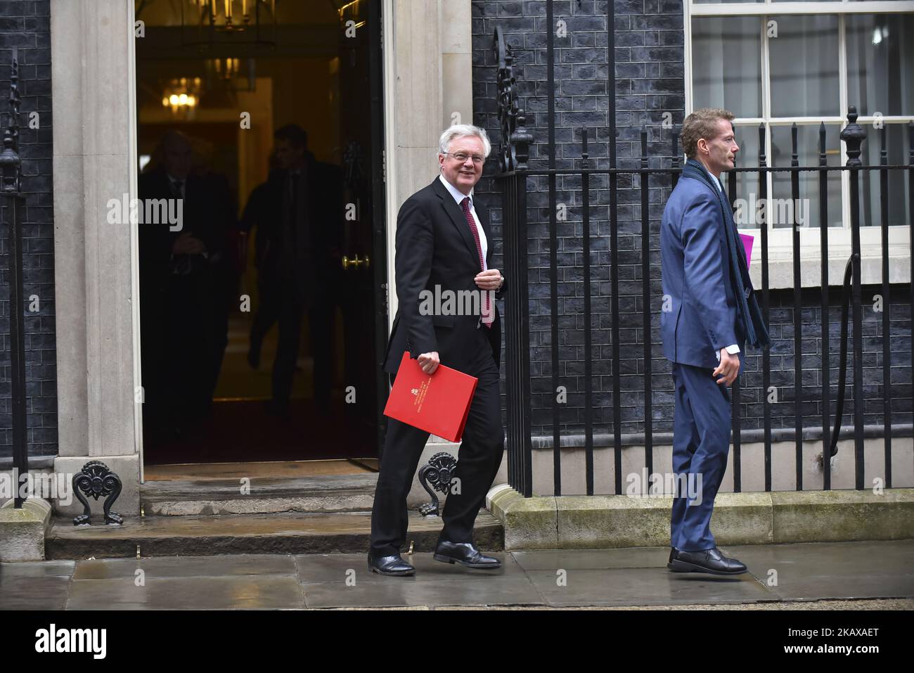 Brexit minister David Davis leaves 10 Downing Street after attending the weekly Cabinet Meeting, London on March 27, 2018. Prime Minister Theresa May is facing another Brexit hurdle after the opposition Labour Party announced its pushing for a legal commitment to avoid a hard border with Ireland after Britain leaves the European Union. The Migration Advisory Committee (MAC) said businesses are concerned about their ability to recruit workers from the EU after Britain leaves the EU. UK employers also see EU workers as 'more reliable' and eager than their British counterparts, the report said. ( Stock Photo