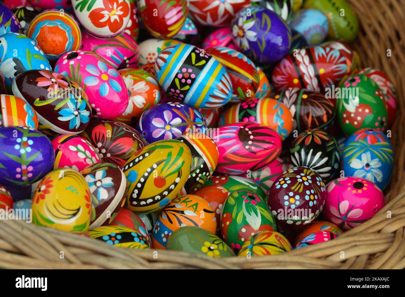 Hand made traditional hand painted Easter eggs (Polish: Pisanki) and baskets on display for sale on Krakow's Easter market. Originating as a pagan tradition, pisanki were absorbed by Christianity to become the traditional Easter egg. Pisanki are now considered to symbolise the revival of nature and the hope that Christians gain from faith in the resurrection of Jesus Christ. On Tuesday, 27 March 2018, in Rynek Square, Krakow, Poland. (Photo by Artur Widak/NurPhoto) Stock Photo