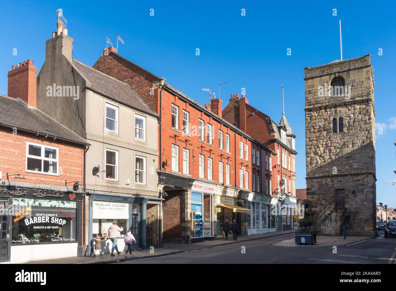 Morpeth clock tower and shops in Oldgate, Northumberland, England, UK Stock Photo