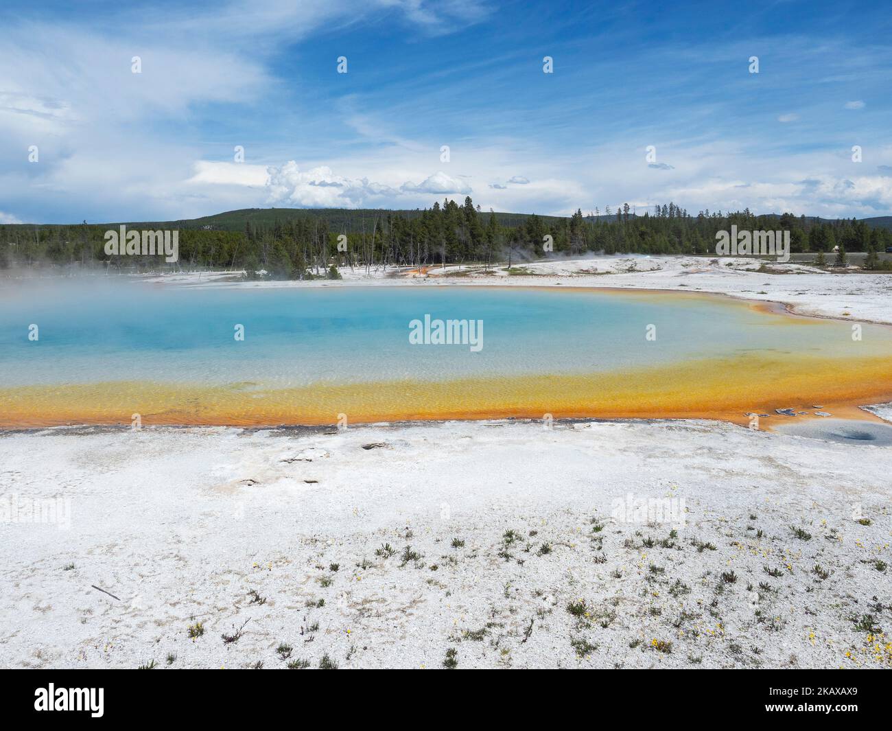 Steam rising from Rainbow Pool, Black Sand Basin, Yellowstone National Park, Wyoming, USA, June 2019 Stock Photo