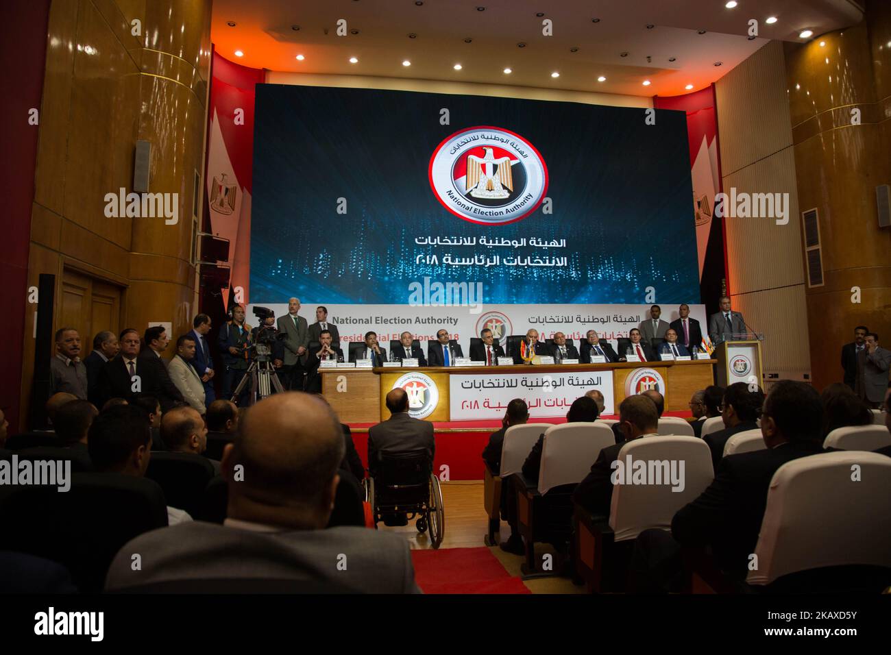 National Elections Authority (NEC) chief Lasheen Ibrahim (C) and Deputy Chief of the NEC Mahmoud al-Sherif (C-L) stand for the national anthem during a press conference in Cairo on April 2, 2018, to announce official result of Egypt presidential election. Egypt's election commission says President Abdel-Fattah el-Sissi has won a second, four-year term with 97 percent of the vote in last week's election, with turnout of 41.5 percent. (Photo by Fayed El-Geziry/NurPhoto) Stock Photo