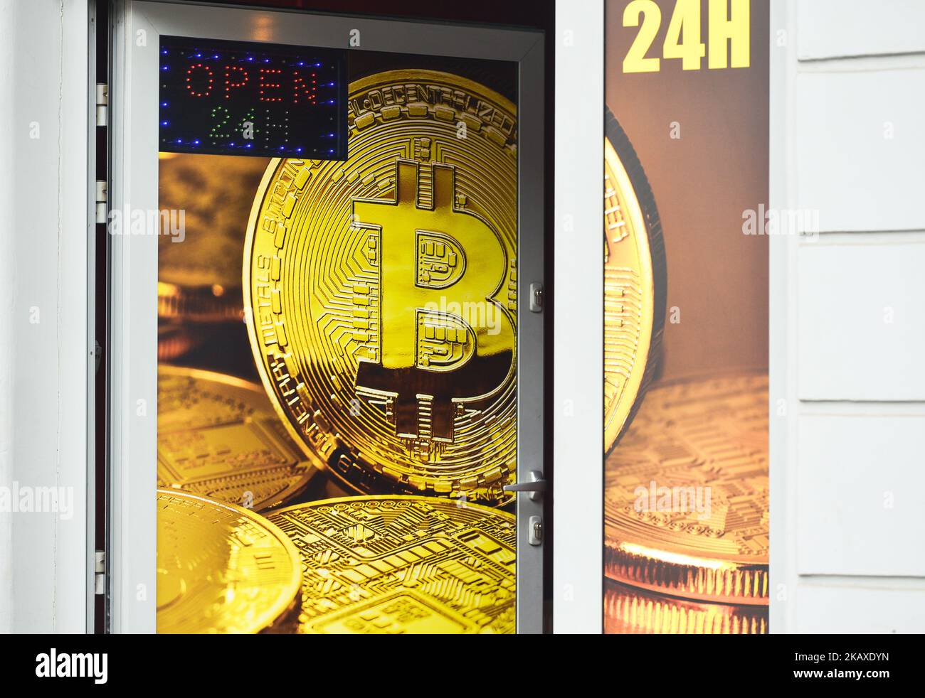 Advertisement for Bitcoin / cryptocurrency exchange on a platform in Madrid,  Spain Stock Photo - Alamy