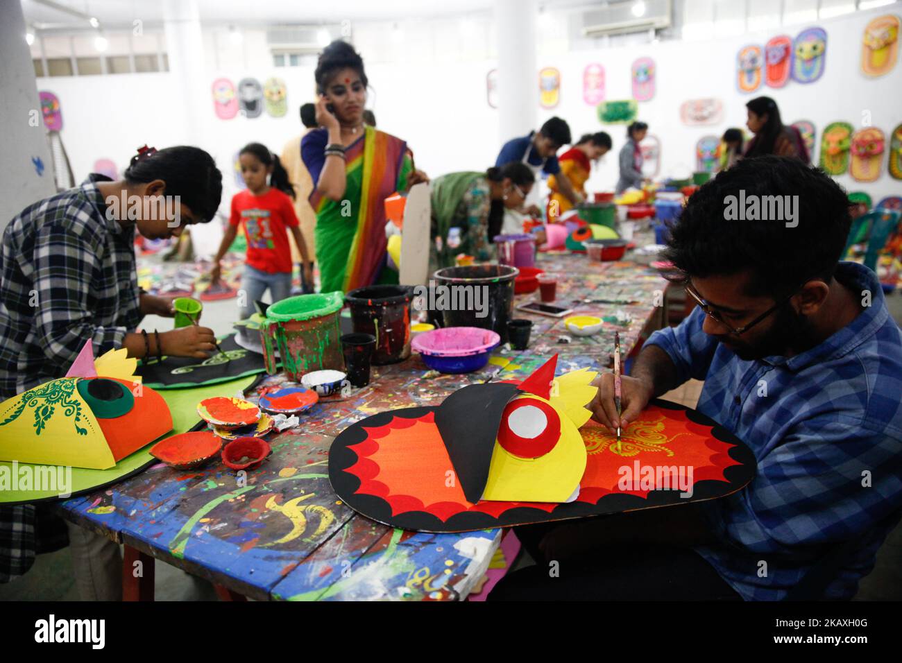 Students of Fine arts of Dhaka University painting masks for colorful preparation to celebrate upcoming Bengali New Year 1425 in Dhaka, Bangladesh 12 April 2018. The day will be celebrated on 14 April while the UNESCO added the Mangal Shobhajatra festival on Pahela Baishakh among other new items to the safeguarding intangible cultural heritage list. (Photo by Mehedi Hasan/NurPhoto) Stock Photo