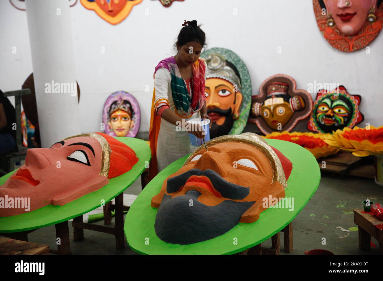 Students of Fine arts of Dhaka University painting masks for colorful preparation to celebrate upcoming Bengali New Year 1425 in Dhaka, Bangladesh 12 April 2018. The day will be celebrated on 14 April while the UNESCO added the Mangal Shobhajatra festival on Pahela Baishakh among other new items to the safeguarding intangible cultural heritage list. (Photo by Mehedi Hasan/NurPhoto) Stock Photo