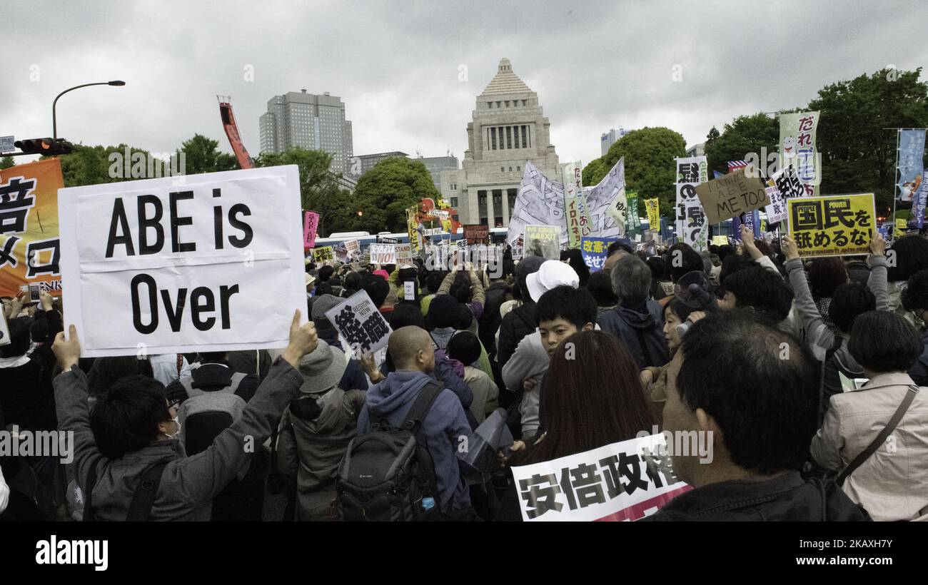 Protester holds a placard during a demonstration against Japan's Prime Minister Shinzo Abe after allegations of corruption, calling him to resign, on April 14, 2018 in front of Tokyo parliament in Tokyo, Japan.(Photo by Richard Atrero de Guzman/NurPhoto) Stock Photo