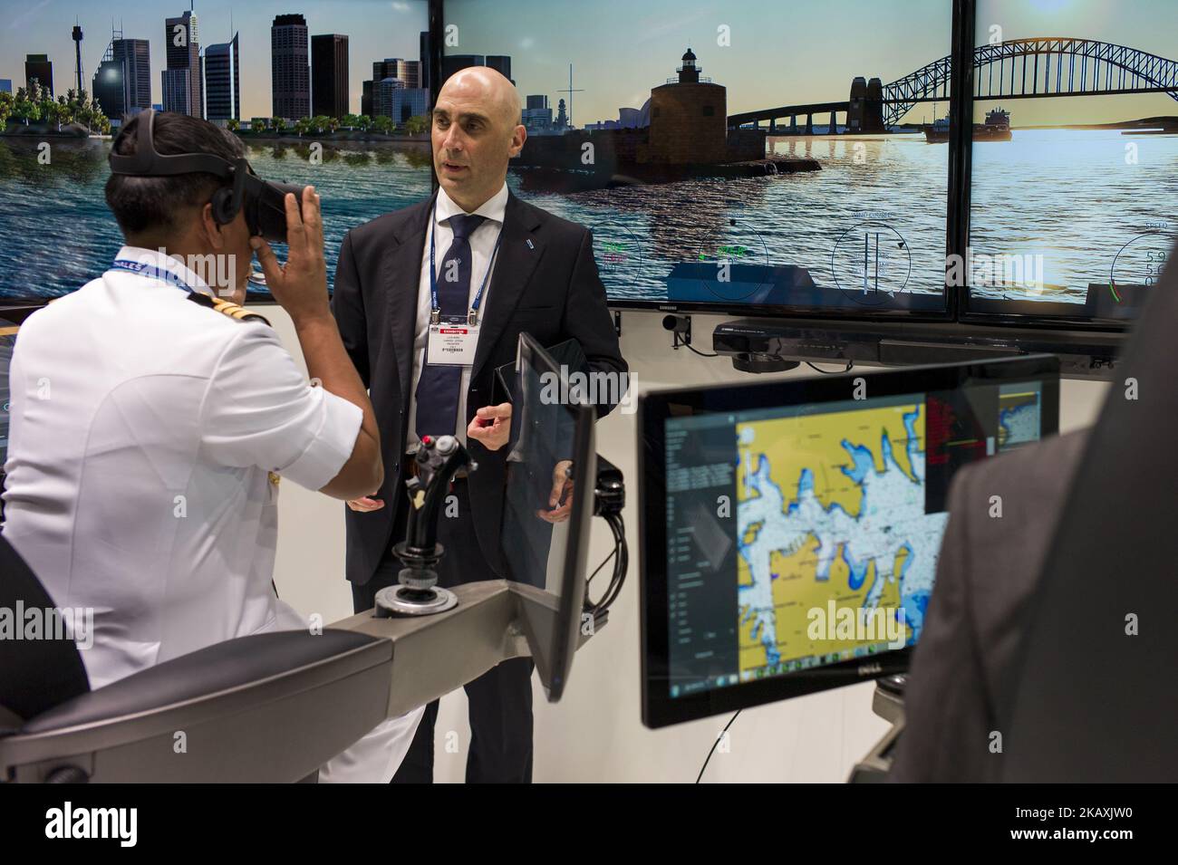 Malaysian Navy captain testing VR simulation at an exhibition booth of