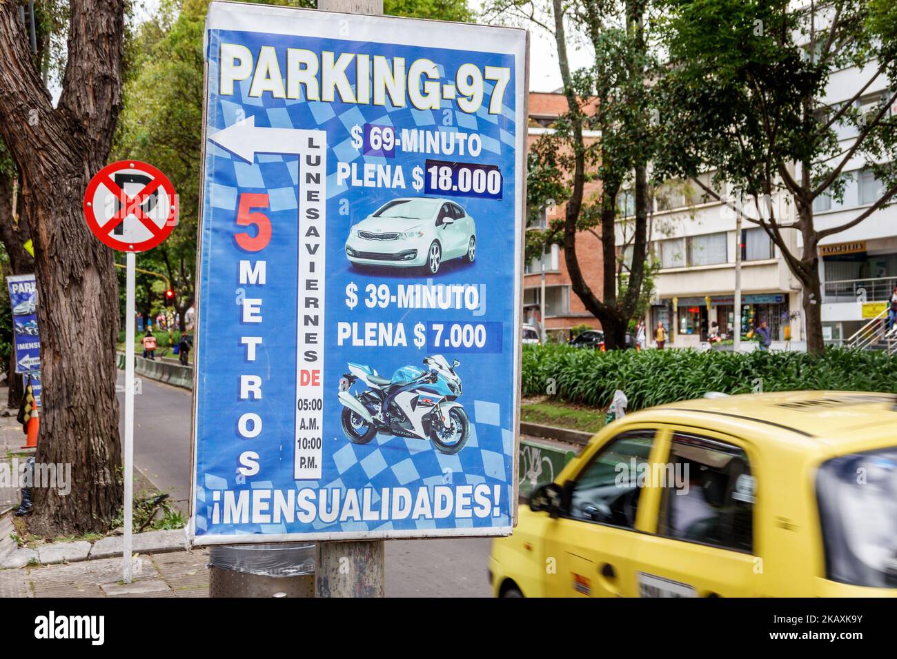 Bogota Colombia,El Chico Carrera 11,parking lot car park prices rates rate per minute,sign billboard information promoting promotion advertising,Colom Stock Photo