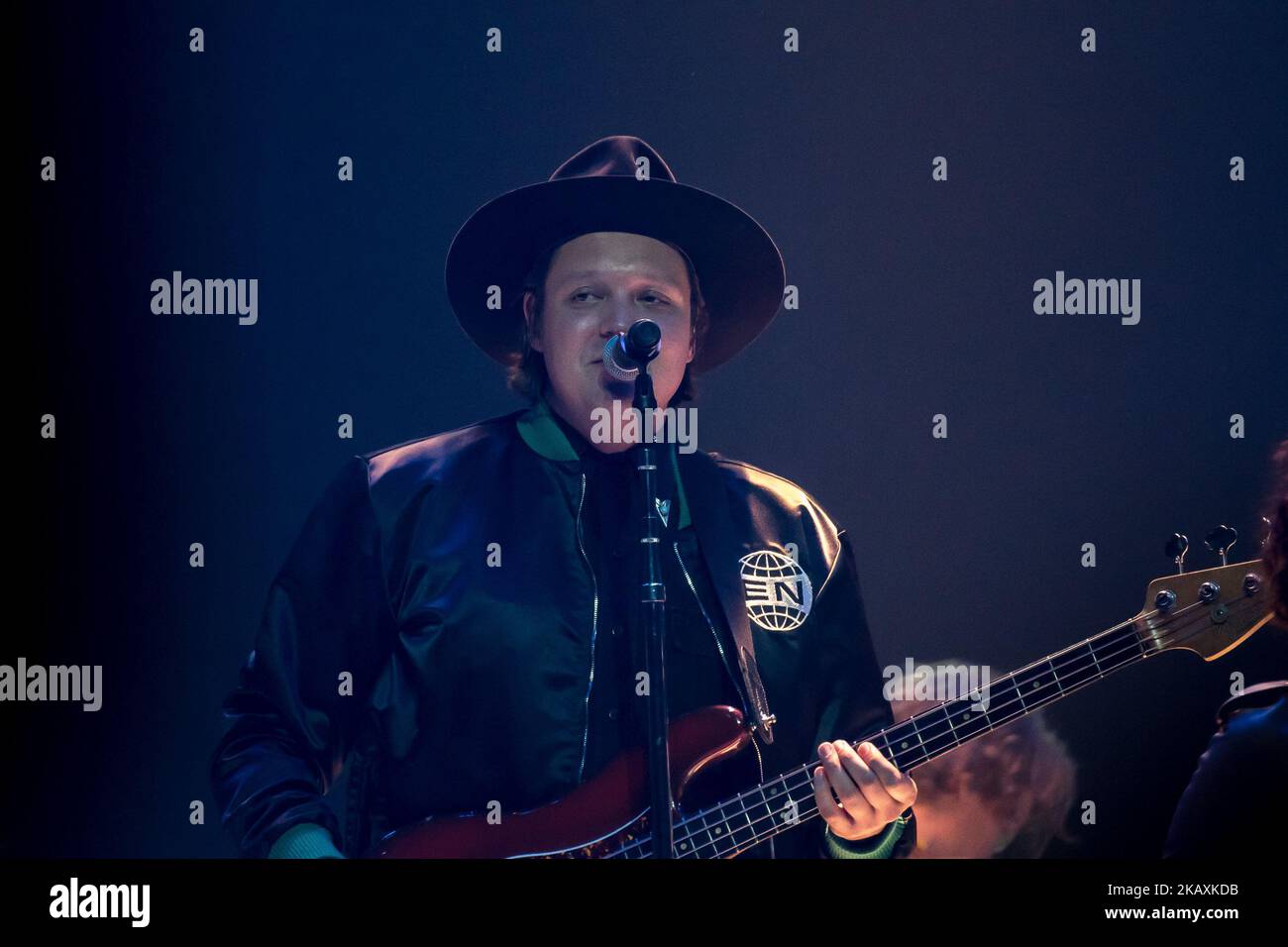 Win Butler of Canadian indie rock band Arcade FIre is pictured on atage as they perform at Arena Wembley, London on April 12, 2018. Arcade Fire is a Canadian indie rock band, consisting of husband and wife Win Butler (vocals, bass, guitar) and Régine Chassagne, along with Win's younger brother William Butler, Richard Reed Parry, Tim Kingsbury and Jeremy Gara. The band's current touring line-up also includes former core member Sarah Neufeld, percussionist Tiwill Duprate and saxophonist Stuart Bogie. (Photo by Alberto Pezzali/NurPhoto) Stock Photo
