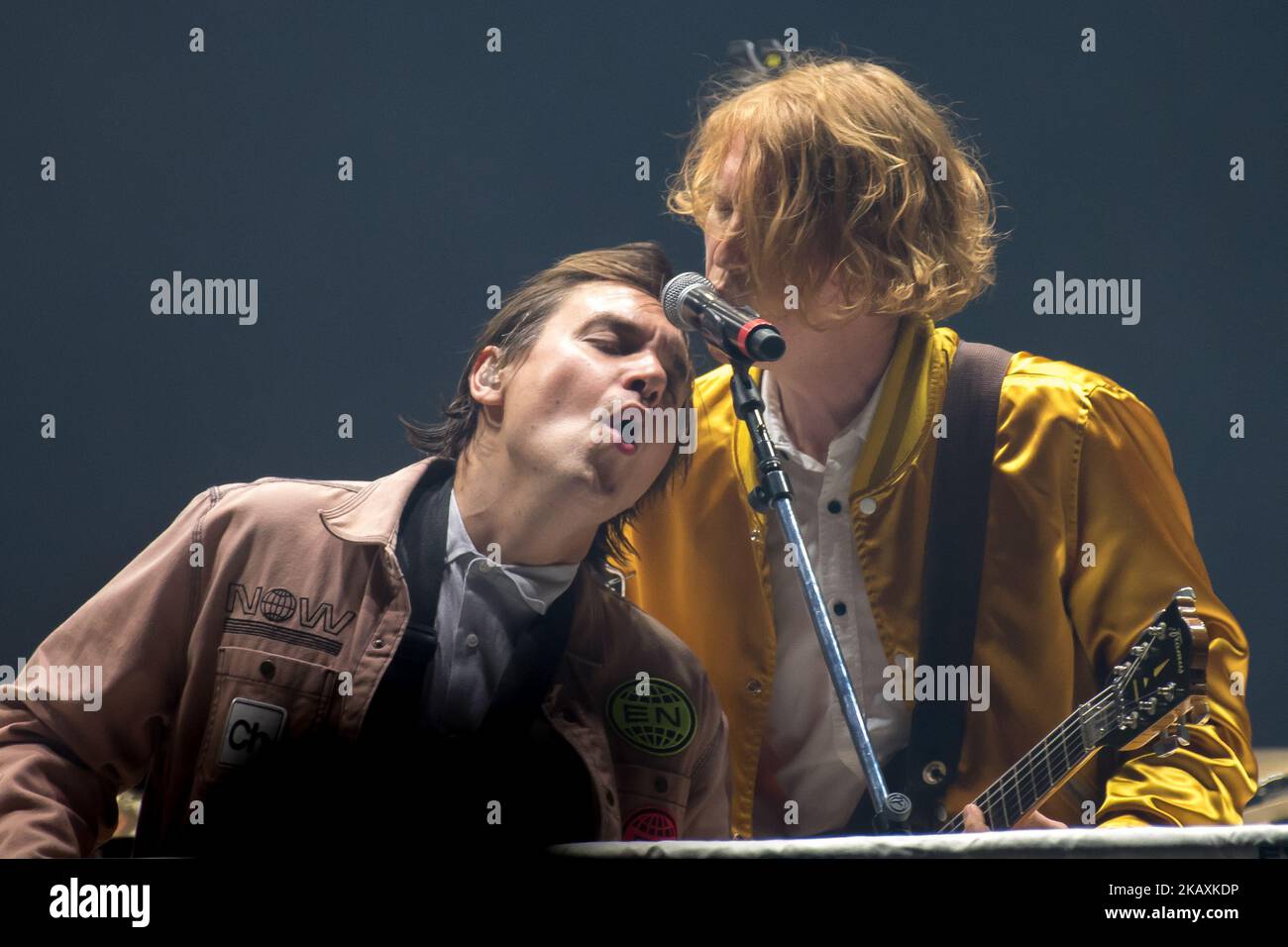 Canadian indie rock band Arcade FIre is pictured on atage as they perform at Arena Wembley, London on April 12, 2018. Arcade Fire is a Canadian indie rock band, consisting of husband and wife Win Butler (vocals, bass, guitar) and Régine Chassagne, along with Win's younger brother William Butler, Richard Reed Parry, Tim Kingsbury and Jeremy Gara. The band's current touring line-up also includes former core member Sarah Neufeld, percussionist Tiwill Duprate and saxophonist Stuart Bogie. (Photo by Alberto Pezzali/NurPhoto) Stock Photo