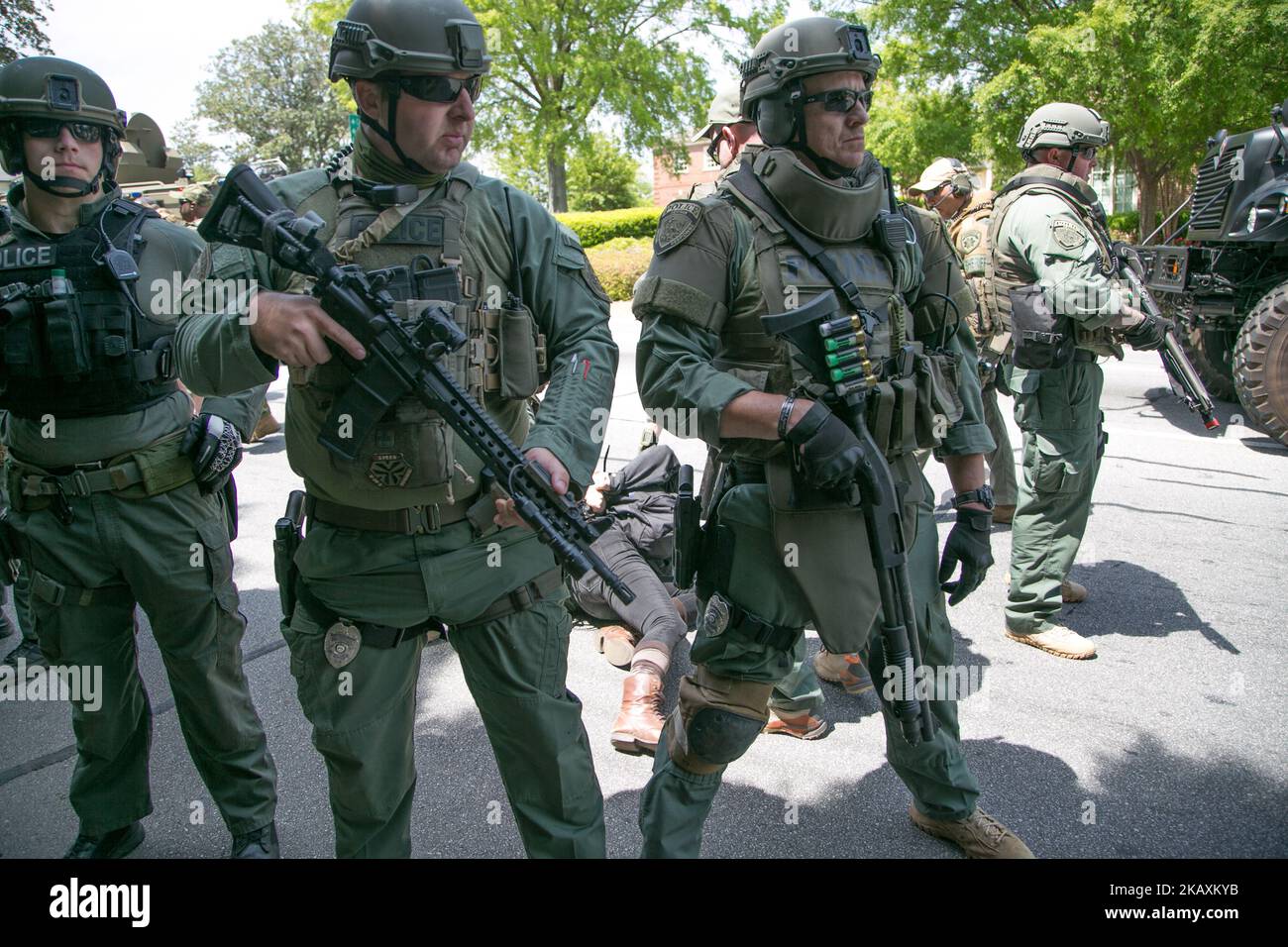 A protester is arrested before a National Socialist Movement rally at Greenville Street Park in Newnan, Georgia, USA on April 21, 2018. (Photo by Emily Molli/NurPhoto) Stock Photo