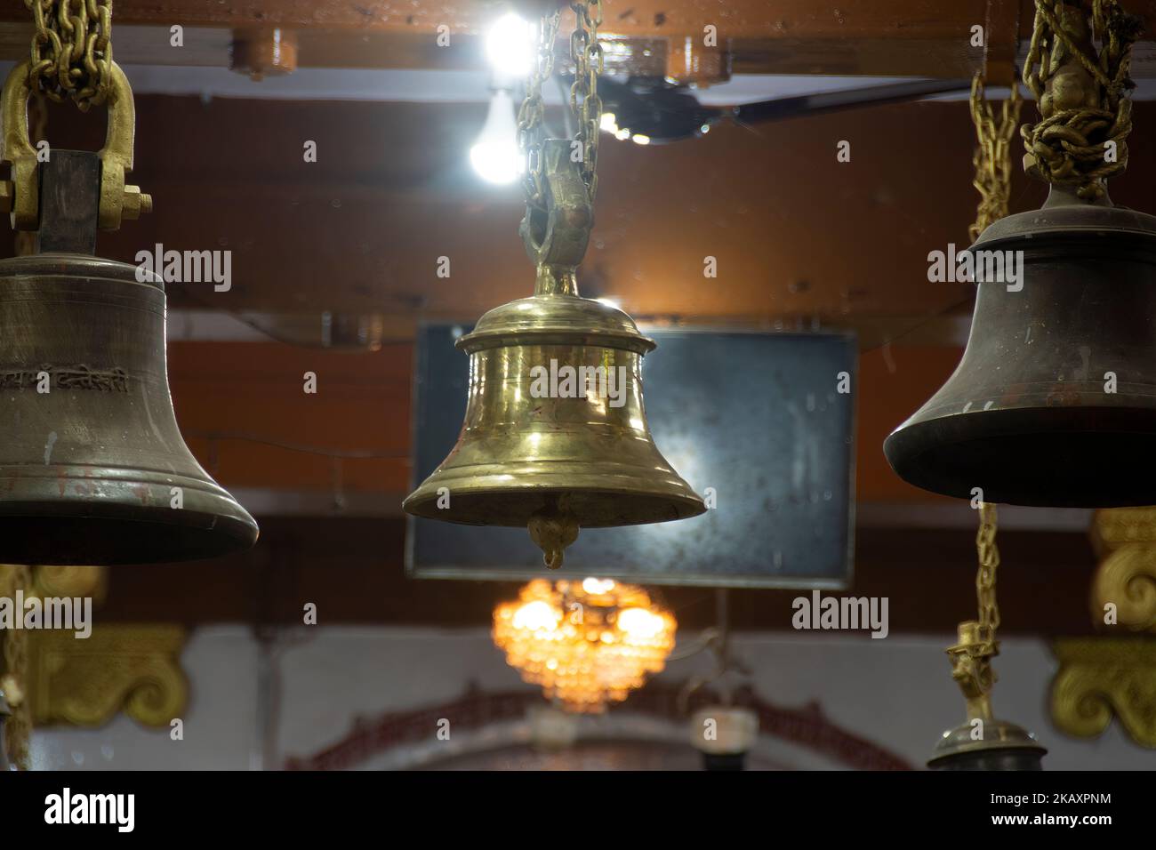 a ritual bell used in Hinduistic religious practices. The ringing of