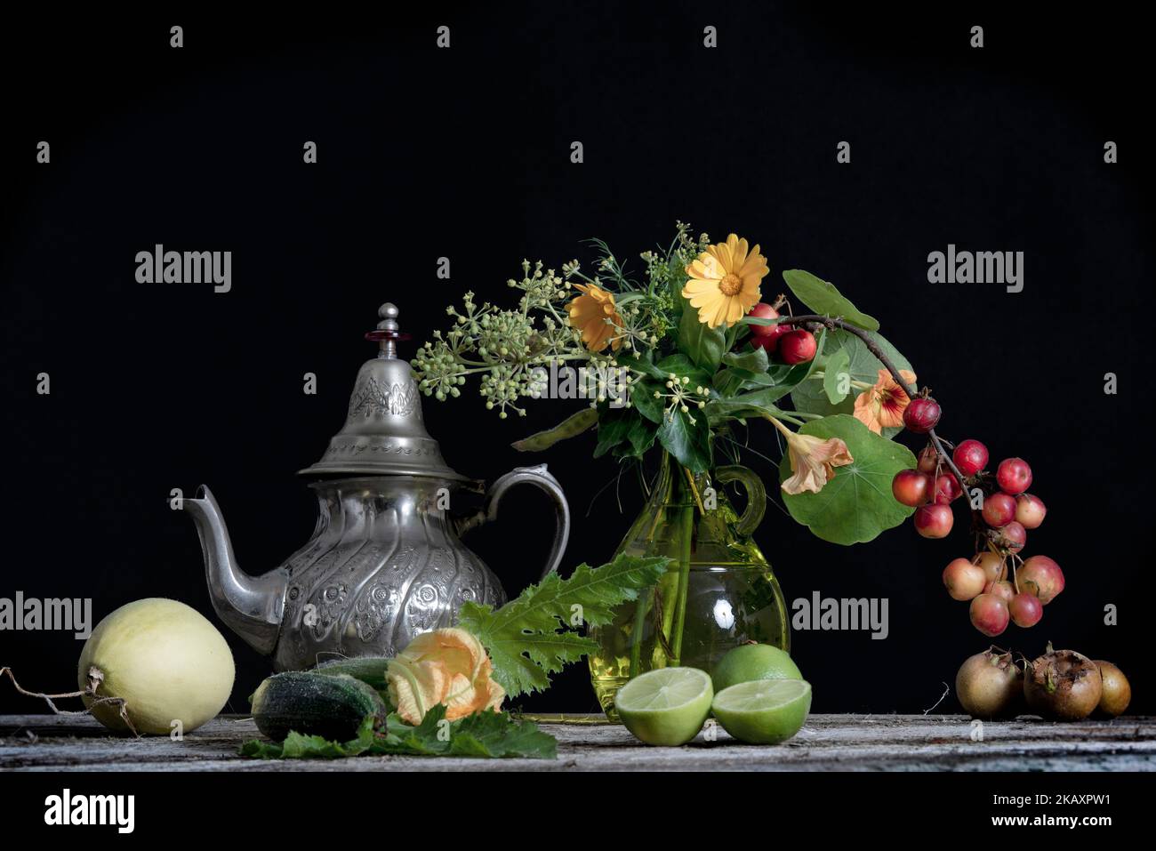 Still Life image of flowers and fruits in a vase Stock Photo - Alamy