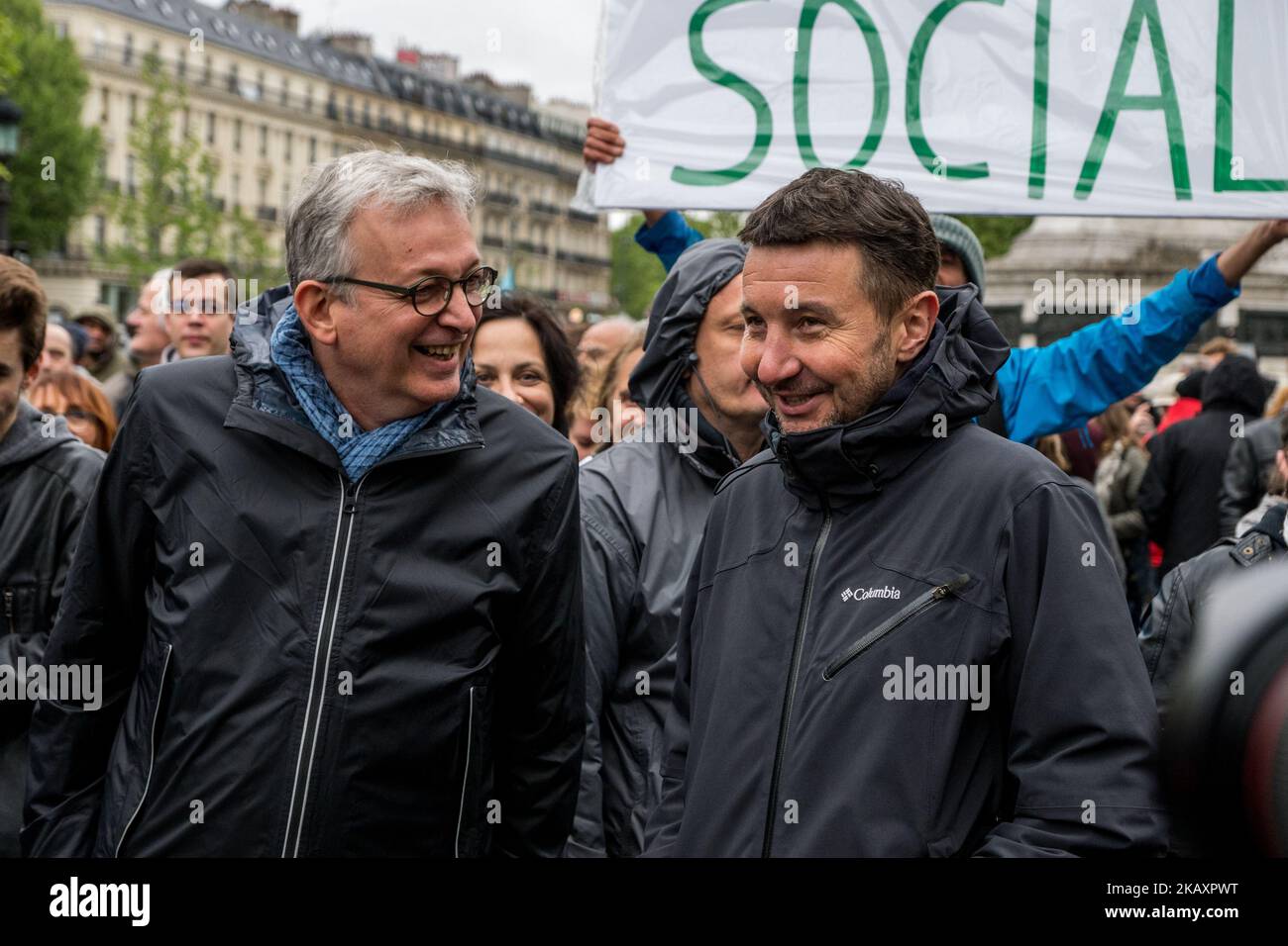 Leader of the French Communist Party Pierre Laurent (L) and French anti-capitalist party NPA leader Olivier Besancenot (R) smile as they take part in a rally in support of social struggles organized by left-wing political parties and movements on April 30, 2018 in Paris. (Photo by Nicolas Liponne/NurPhoto) Stock Photo