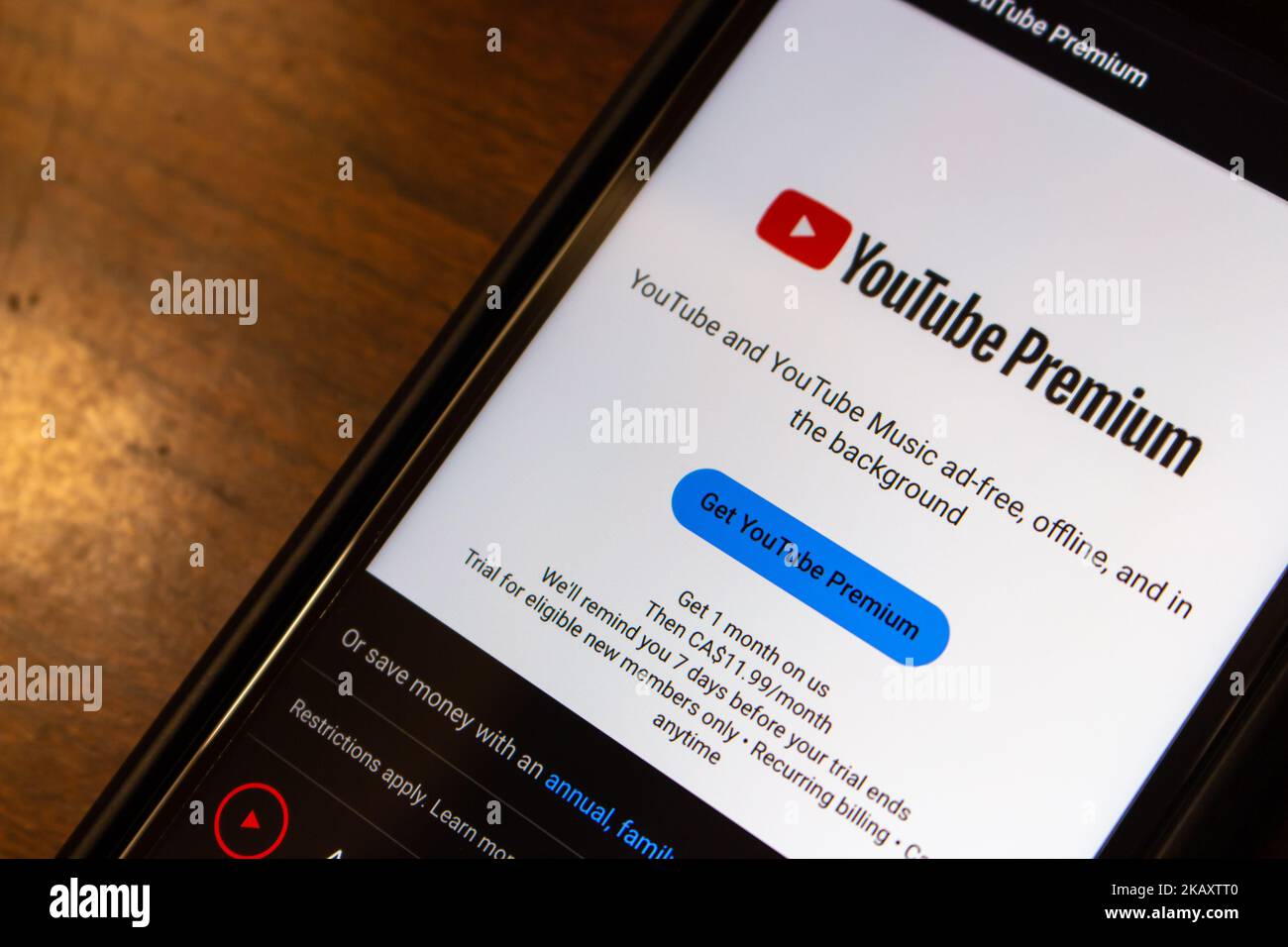 Website of YouTube Premium on iPhone. YouTube Premium is a subscription service provides ad-free access to content and access to premium services Stock Photo
