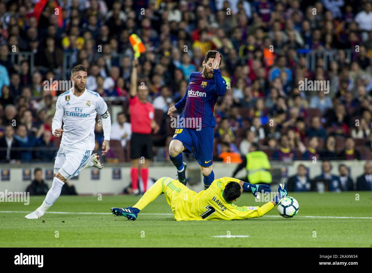 10 Leo Messi from Argentina of FC Barcelona defended by 04 Sergio Ramos from Spain of Real Madrid and 01 Keylor Navas from Puerto Rico of Real Madrid during the La Liga derby football match between FC Barcelona v Real Madrid at Camp Nou Stadium in Spain on May 6 of 2018. (Photo by Xavier Bonilla/NurPhoto) Stock Photo