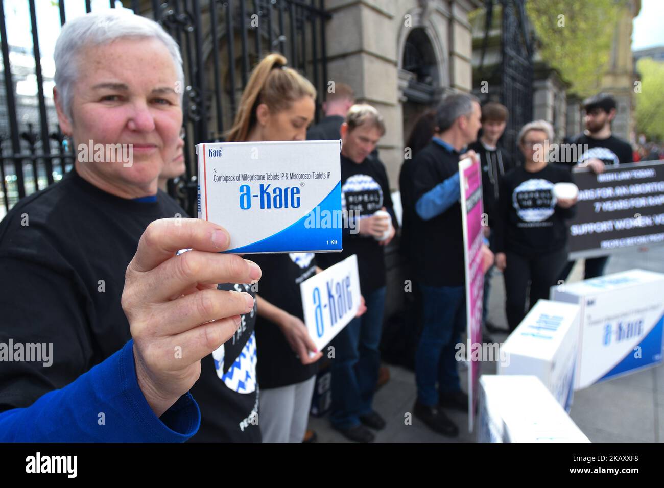 Brid Smith TD and other members of People Before Profit political party, hold signs, billboards, and packs of a kare abortion pills outside Leinster House, advocating repeal of the Eighth Amendment of the Irish Constitution - the referendum takes place on May 25th. On Thursday, May 10, 2018, in Dublin, Ireland. (Photo by Artur Widak/NurPhoto)  Stock Photo